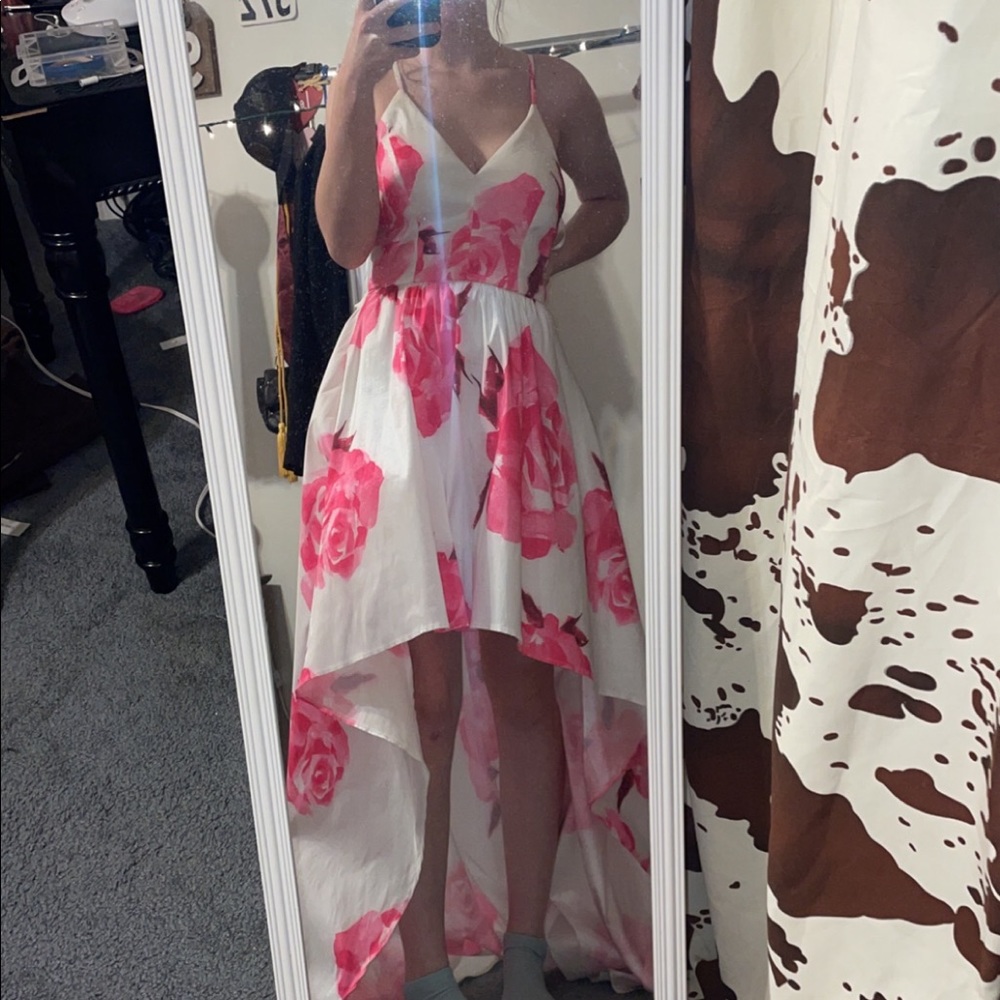 Low in the front and long in the back❤️ I absolutely adore this dress!